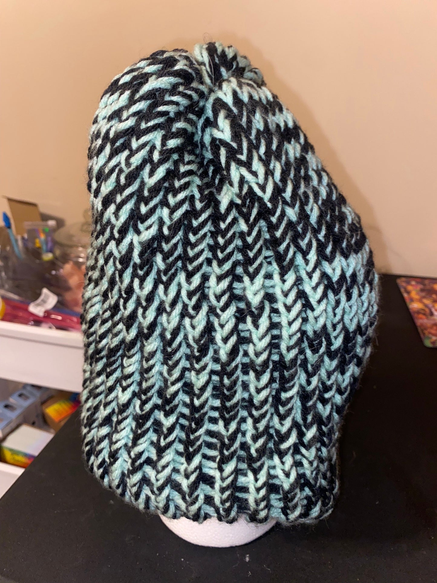 Mint and Black hat